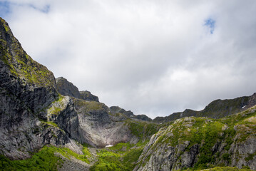 Beautiful Nature Norway natural landscape.  Scenic outdoors view. Ocean with waves and mountains. Explore Norway, summer adventure