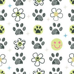 Daisies, smile faces, paw prints seamless fabric pattern