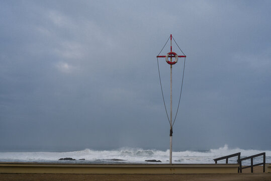 Winter ocean view with safety pole