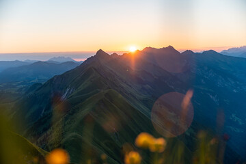 Warm summer sunrise in the alps