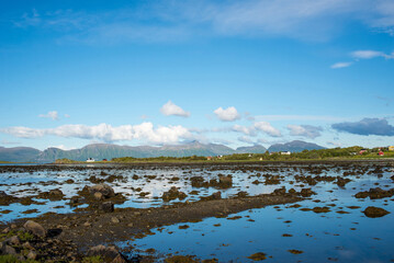 Beautiful Nature Norway natural landscape.  Scenic outdoors view. Ocean with waves and mountains. Explore Norway, summer adventure