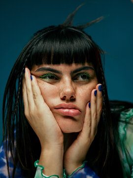 Young woman with bored expression