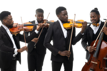 Studio portrait of a string quartet on a white background. African americans