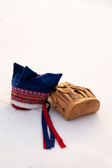 Four Winds hat, traditional Sami hat, and leather backpack. Finland