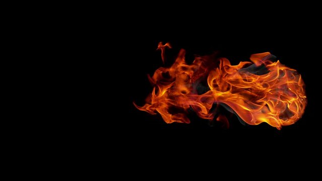 Super slow motion of fire isolated on black background. Filmed on high speed cinema camera