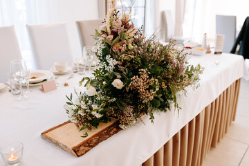 Elegant Floral Wedding Bouquet of Flowers Decoration in Reception Wedding Hall 