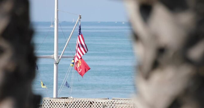 US And Marine Corps Flag With Ocean