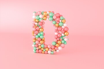 Letter D made of glass balls, pastel pearls, crystal jewels and gold.