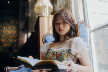young woman reading a book