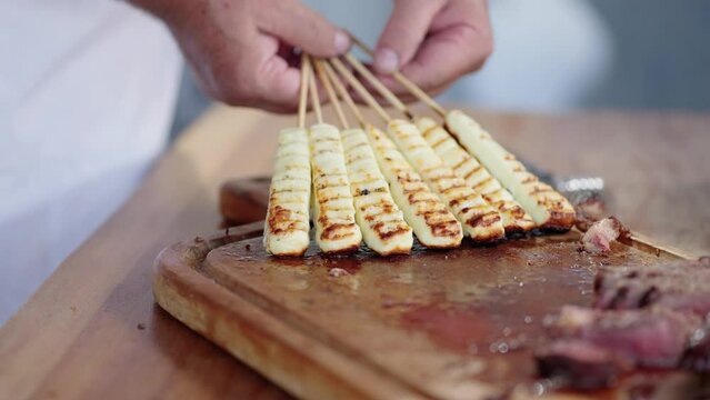 grilled Brazilian "queijo coalho" cheese. Traditional brazilian barbecue
