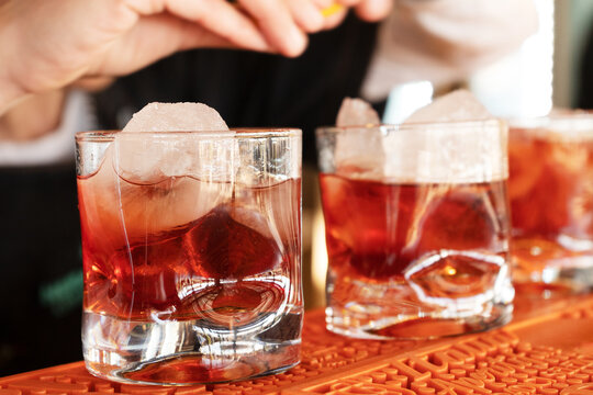 Glass of drink with a strong drink with ice