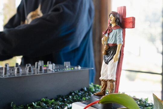 Saint figurine at an outdoor disco