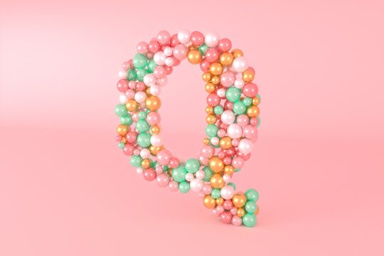 Letter Q made of glass balls, pastel pearls, crystal jewels and gold.