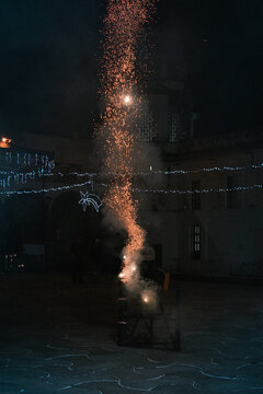 Fireworks going from the launching platform leaving a trail of sparks