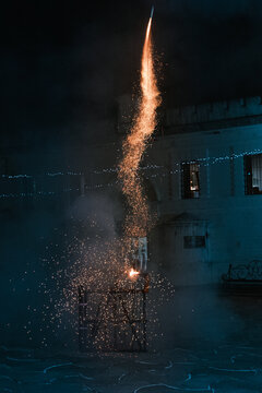 Fireworks going from the launching platform leaving a trail of sparks