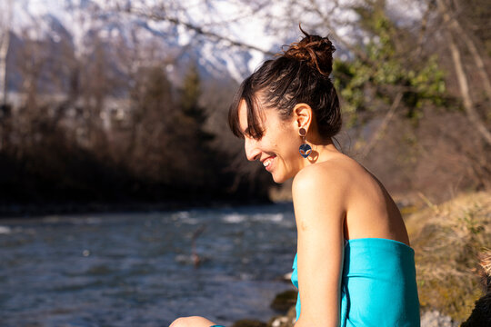 Beautiful girl by an ice river 