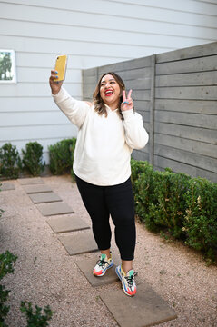 Woman Posing outside.