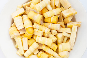Bamboo shoots on white background.