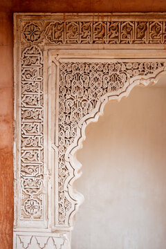A decorated arch in a building in Marrakech, Morocco