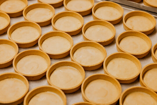 Empty tart cases on table