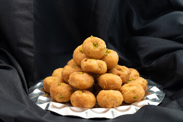 Indian Mithai Balushahi Also Called Balsaahi, Badushah, Khurmi, Glazed Doughnuts Made Of All Purpose Plain White Flour Maida, Desi Ghee, Claified Butter Drenched Soaked in Cheeni Ki Chasni Sugar Syrup