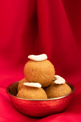 Traditional Ball Shaped Indian Mithai Besan Ke Laddu, Ladoo Or Laddoo Made from Bengal Gram Flour, Chickpeas, Dry Fruits, Nuts And Roasted In Desi Ghee Or Clarified Butter