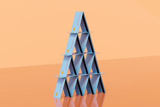 Blue credit / debit house of cards / pyramid. Debt / payment concept