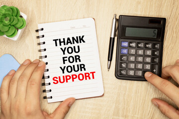 Man Hand writing Thank you For Your Support with black marker on visual screen. Isolated on...
