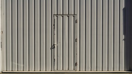 metal door of industrial factory as background