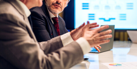 Group of millennial professional business discussing meeting strategy sharing idea with new project.Creative business people working talk  plan and brainstorm in meeting room at modern office