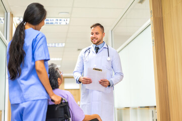 Obraz premium Man doctor wearing uniform with stethoscope service help support discussing and consulting talk to sick senior asian woman patient about checkup result information in hospital.healthcare and medicine