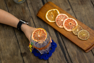 hand holding a drink