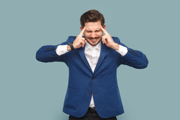 Sick ill frustrated man with mustache standing with hands on hand, frowning face from pain,...