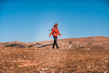 A mountaineer enjoys walking and exploring mountain areas