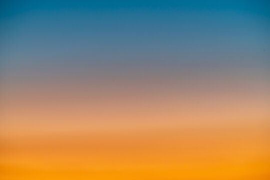 Sky gradient from blue to orange sunset