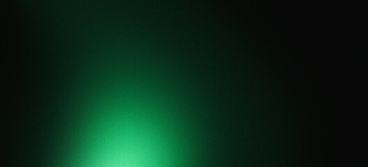 Dark green color gradient grainy background, illuminated spot on black, noise texture effect, wide banner size