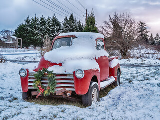 Red Pickup Truck In The Snow