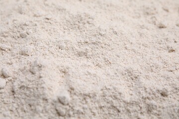 Fototapeta na wymiar Pile of oat flour as background, closeup