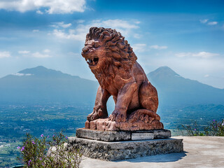 Stone Lion With Volcanoes