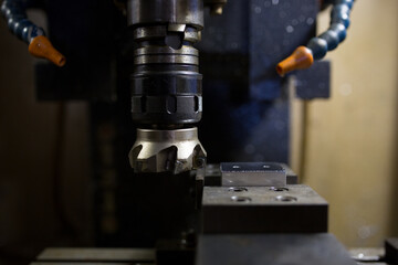 Parts processing at machining center