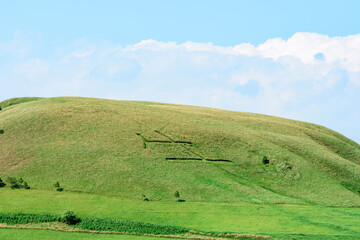 Fototapeta na wymiar 北海道中標津の牛の字のモアン山 