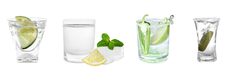 Set with tasty alcoholic drinks in shot glasses on white background