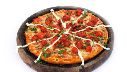 Delicious pizza served on wooden plate isolated on white