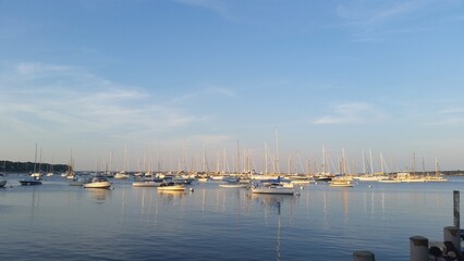 Fototapeta na wymiar boats in water at sunset