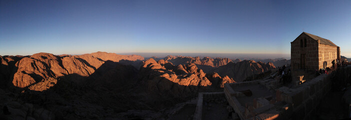 Sunrise at Mount Sinai on Suez Peninsula in Egypt with panoramic view