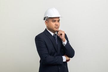 Businessman manager owner real estate thinking on isolated white background. Cooperation of architect designer. Engineer with safety helmet checking at working construction site