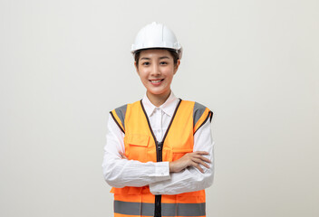 Asian engineer worker woman or architect with white safety helmet standing on isolated white background. Mechanic service factory Professional work job occupation in uniform.