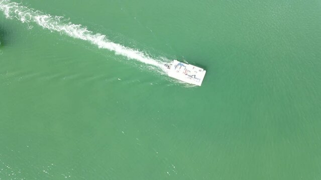 boat moving through channel - aerial view