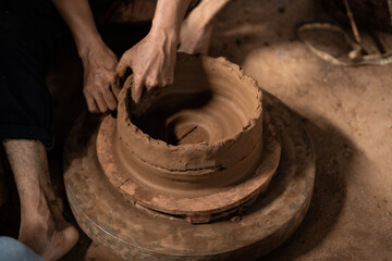 The process of forming traditional pottery crafts, located in Kasongan, Yogyakarta, Indonesia