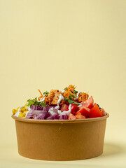 brown rice, cajun chicken, tomato, corn, black beans, carrots, onion, cilantro, and greek yogurt ranch dressing